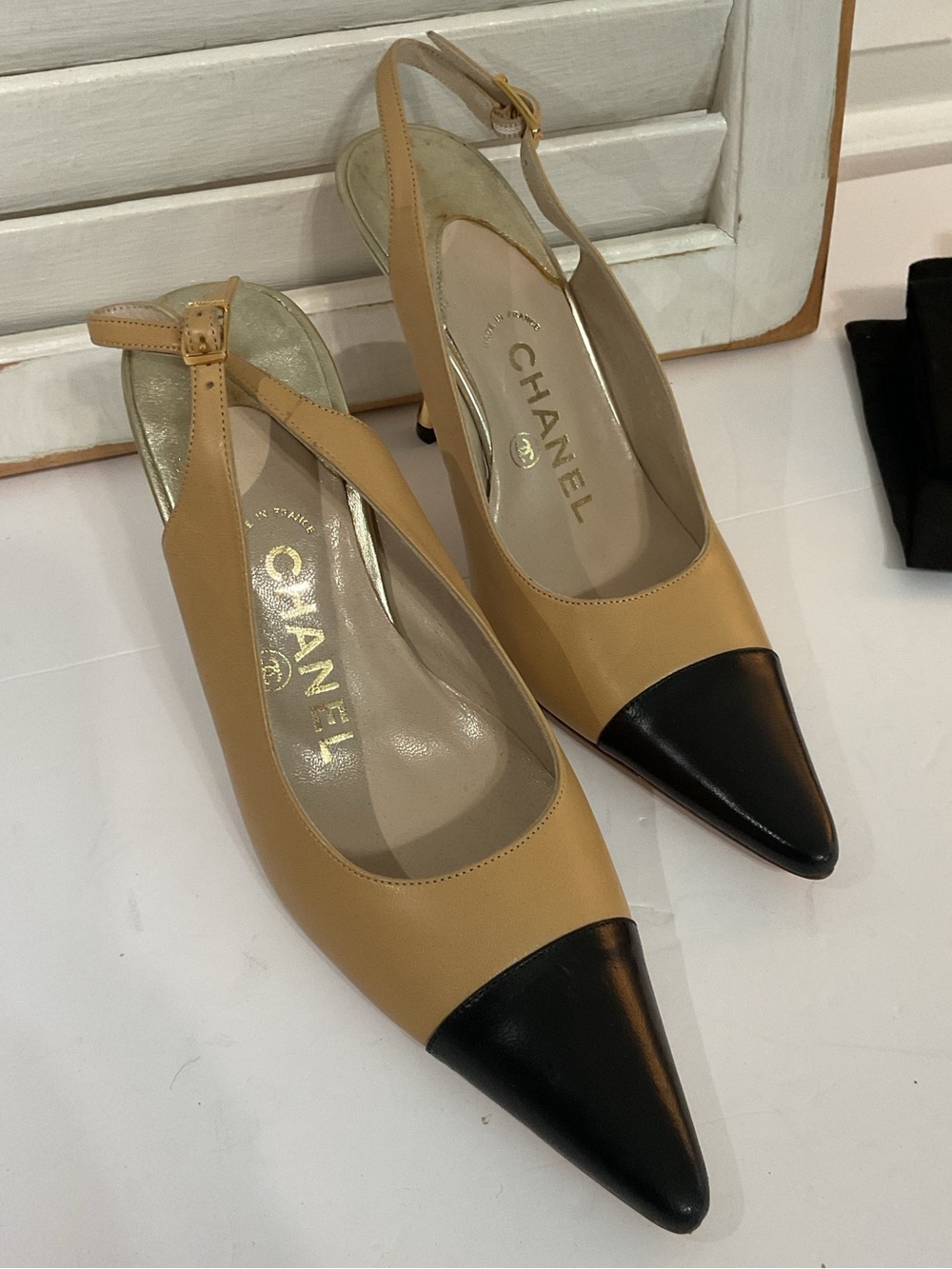 CHANEL Beige and Black Pointed Slingback Pumps